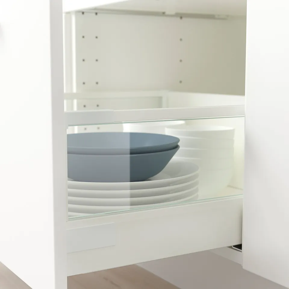 Glass-sided drawer organiser, stacking plates and bowl neatly.
