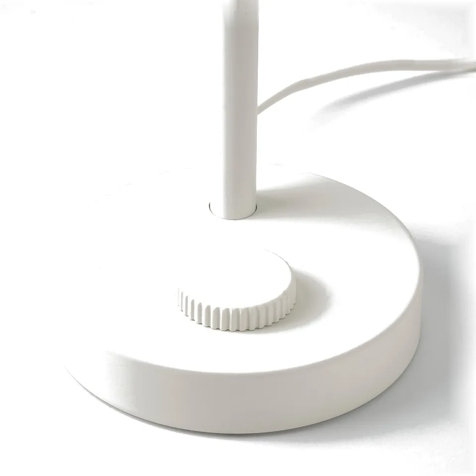 Modern table lamp with sleek white design, rounded base, and adjustable neck.