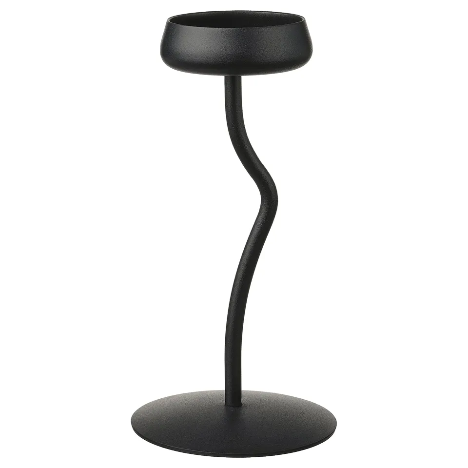Black SILVERPÄRON candlestick, sleek winding stem, stable round base, modern organic design.