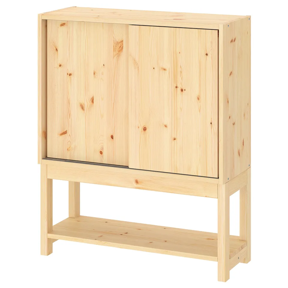 IVAR light wood cabinet, rectangular, sliding doors, natural finish, pine wood, minimalist design.