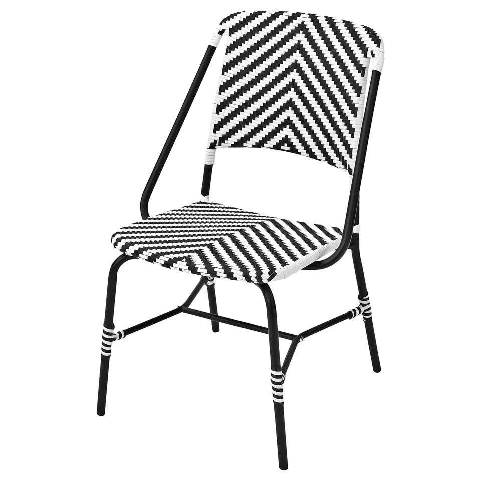 VASSHOLMEN: black & white wicker chair, stylish, comfortable, weather-resistant for outdoor dining.
