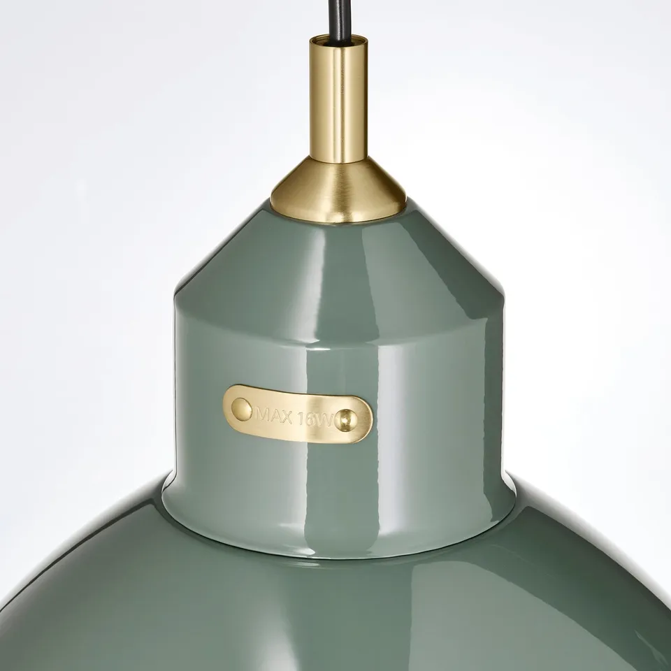 Modern green pendant lamp with gold accents & 16w label.