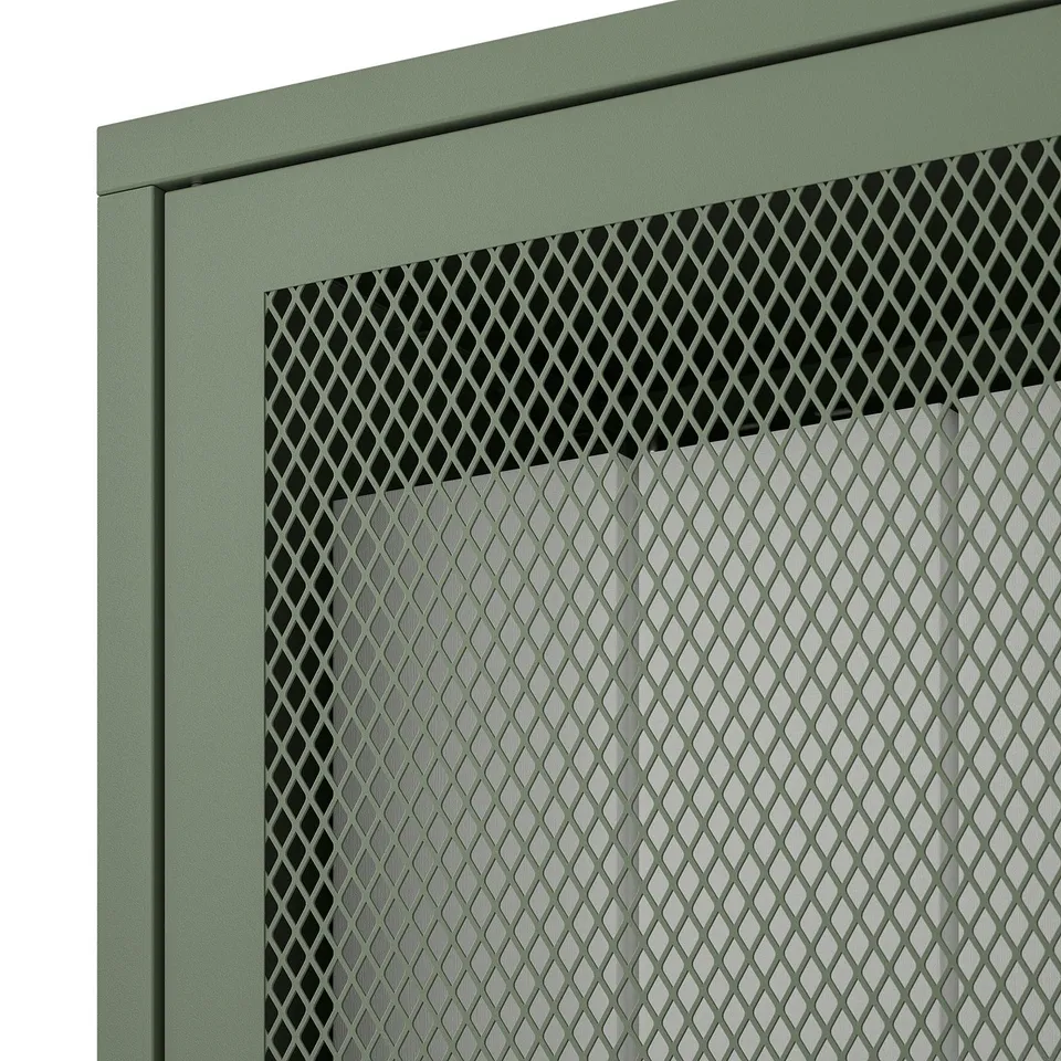 Close-up of green IVAR cabinet with textured mesh door, framed in sturdy steel.