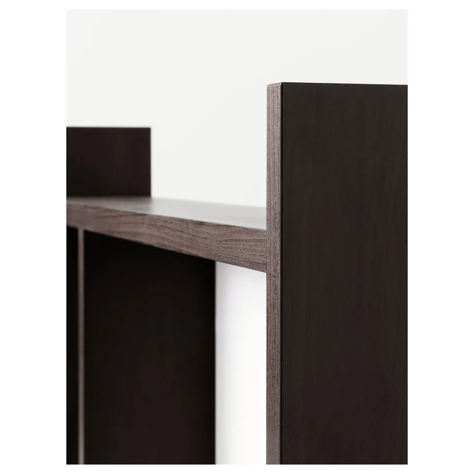 Dark wooden furniture close-up, showing smooth finish and craftsmanship.