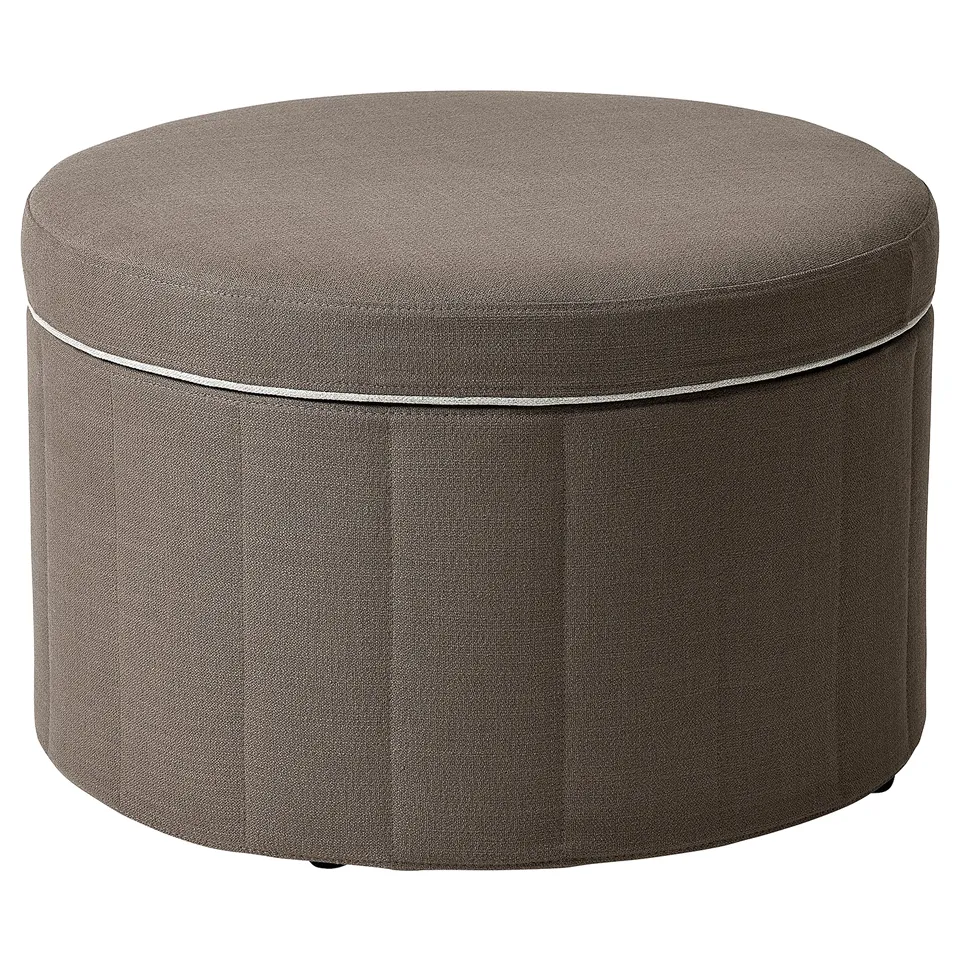 A grey round storage ottoman named SIDSJÖ with hidden compartments and elegant piping.