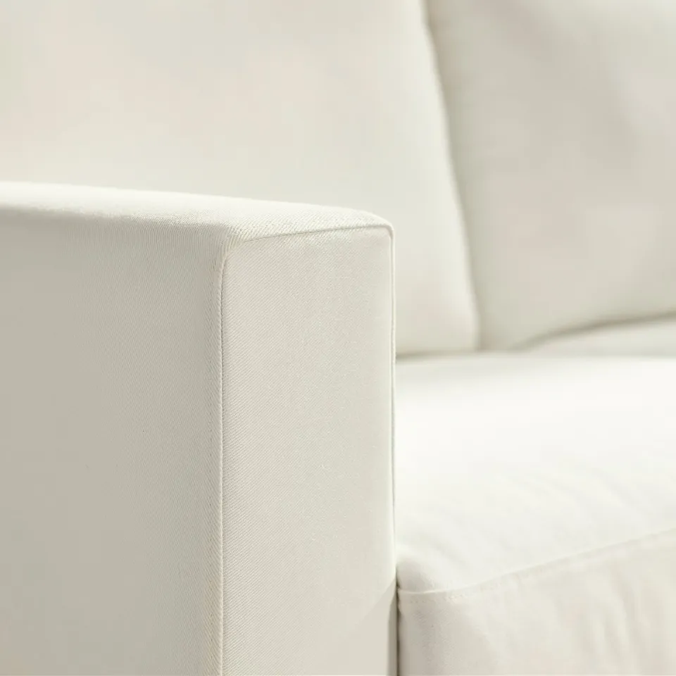 Close-up of SALTSJÖBADEN sofa, showcasing premium fabric texture and clean design.