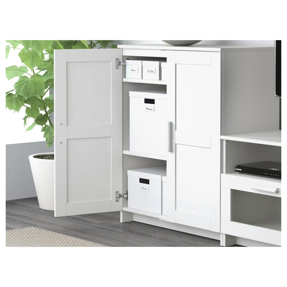White cabinet with open door showing adjustable shelves, suitable for tv up to 72 inches.