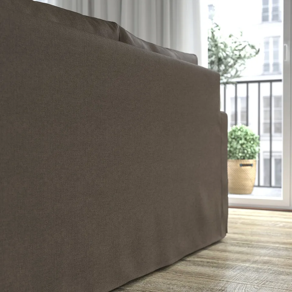 Close-up of HYLTARP sofa, showing high-resilience foam cushions and storage compartment under chaise.