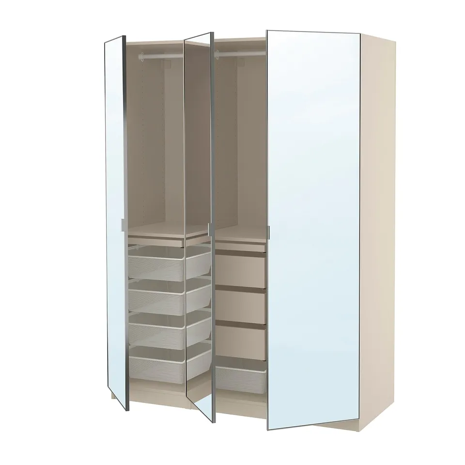 Light-colored, mirror-fronted PAX wardrobe open, showing storage shelves and mesh drawers.