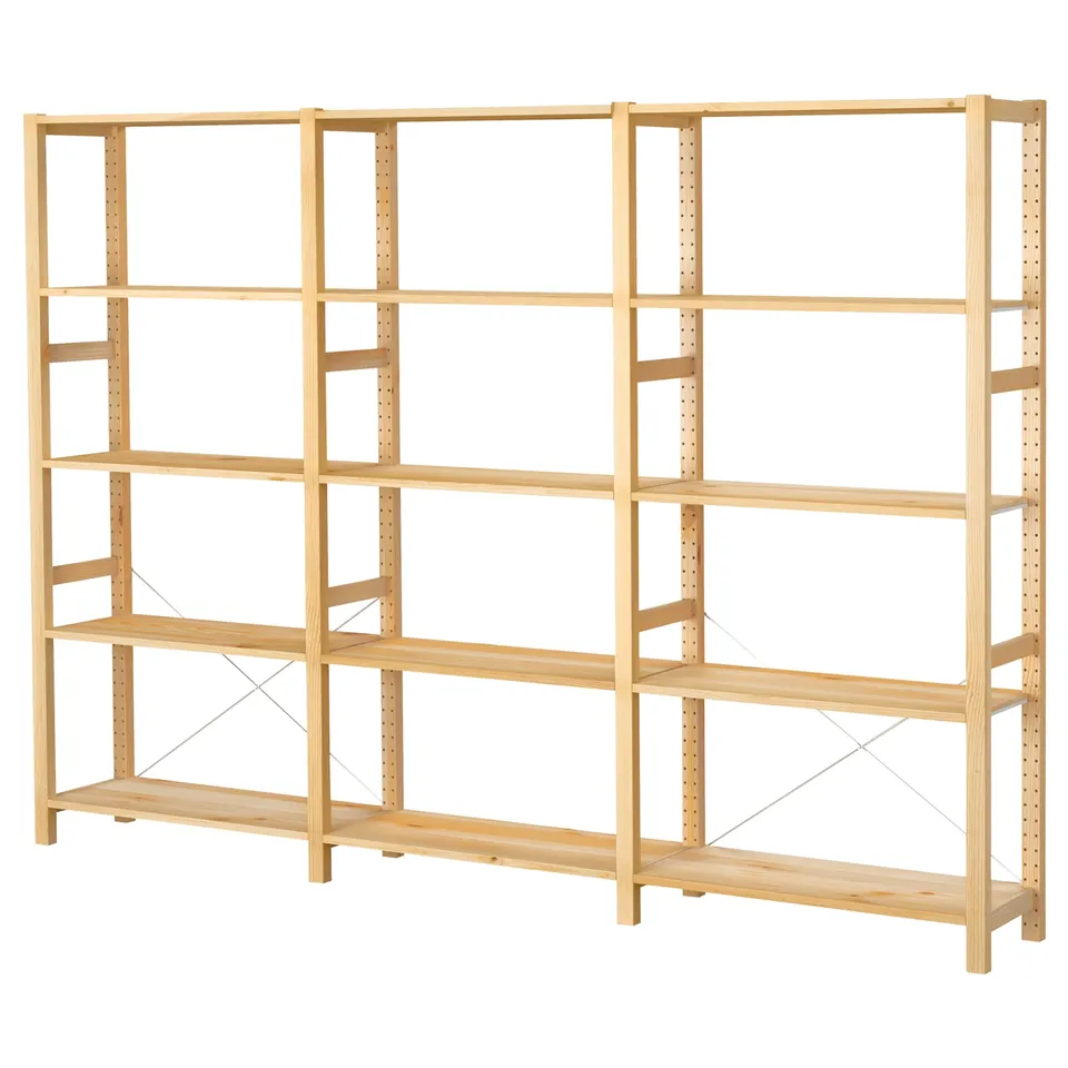 IVAR light wood shelving unit, six shelves, natural pine finish, simple design, rectangular shape, sturdy construction.
