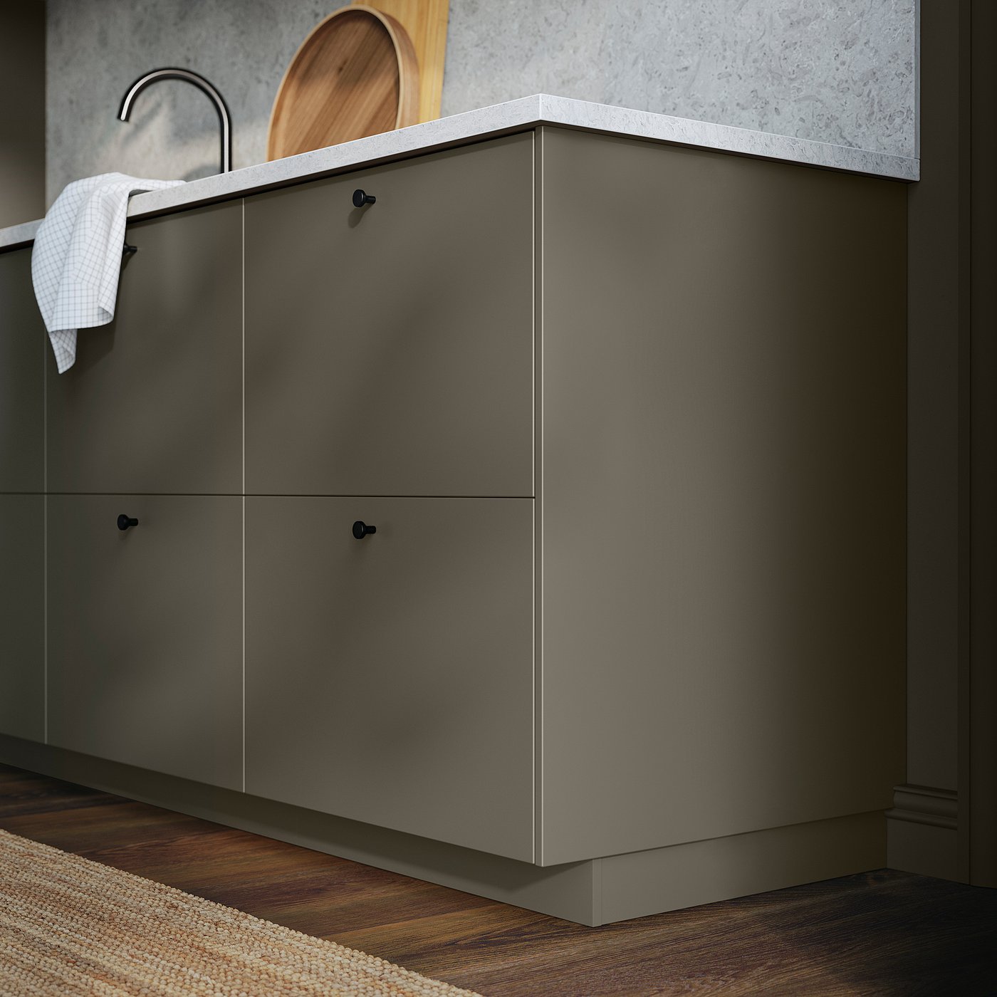 Modern kitchen HAVSTORP dark grey cabinets with smooth surfaces and sleek black handles.