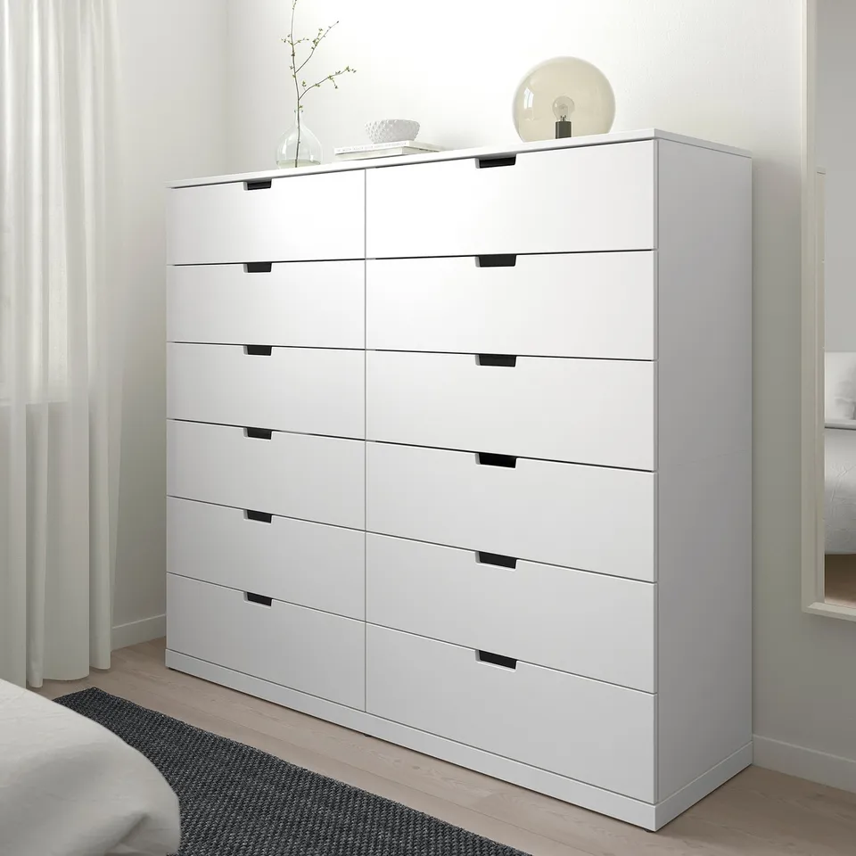 Ikea NORDLI white 8-drawer chest, modern minimalist design, tall, fits beside bed.