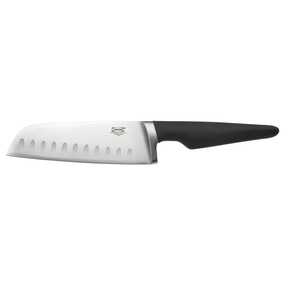 A VÖRDA knife with a black handle and stainless steel blade, designed with indentations for easy cutting and a firm grip.