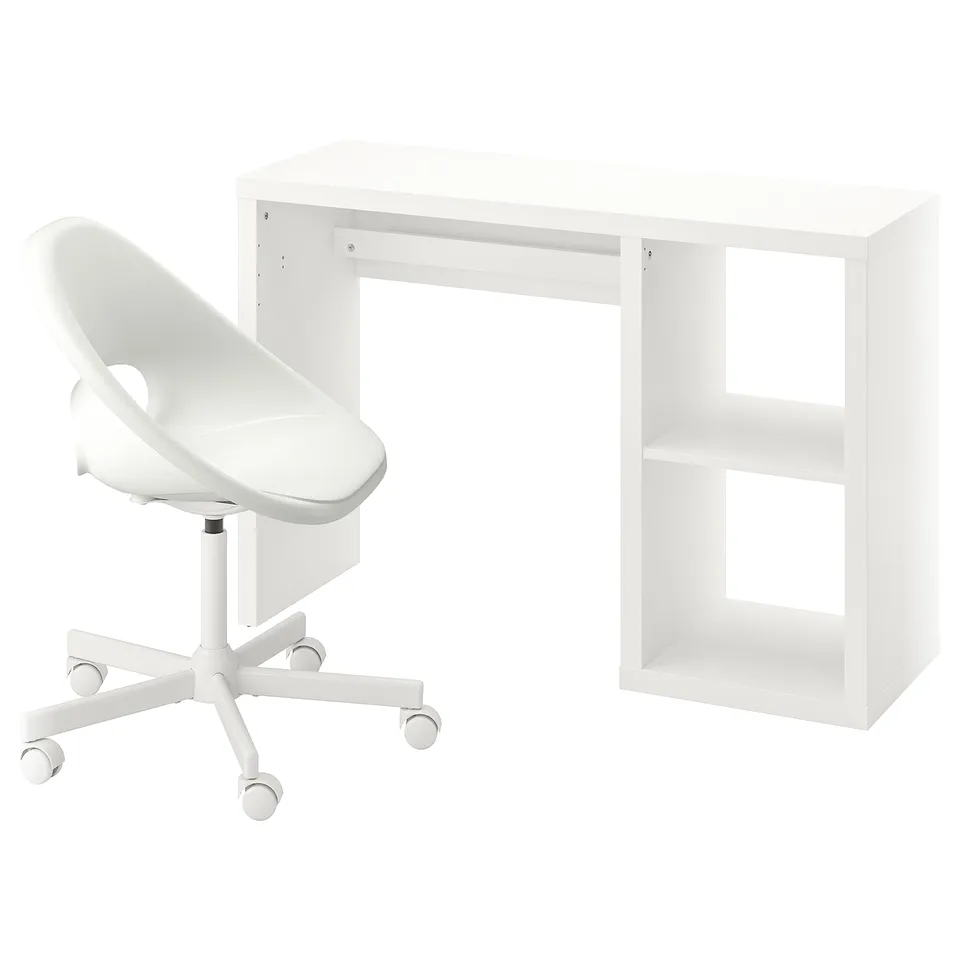 A white ikea KALLAX desk and chair. The desk is rectangular with open shelves. The chair has a white seat and five wheels.
