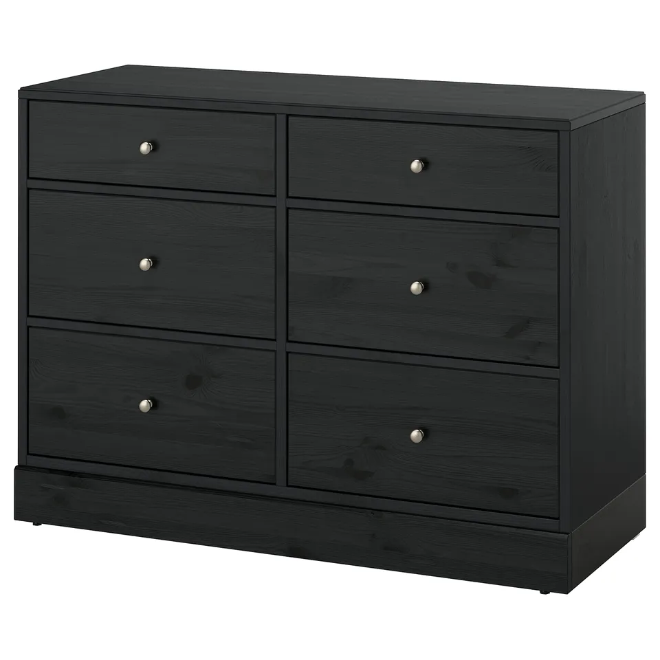 A dark grey HAVSTA chest of drawers with six large drawers. Crafted from solid pine, it boasts a sleek, modern design ideal for bedrooms.