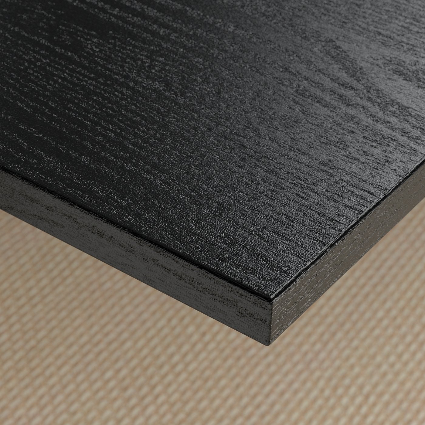 Elegant black table top with smooth, durable finish. Stain-resistant surface, easy to clean. Stands on woven mat, adding texture.