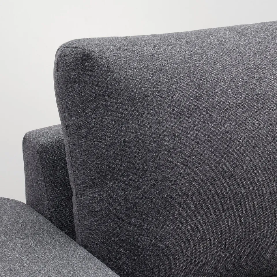 Close-up of VIMLE sofa, soft grey fabric, clean lines, sturdy design.