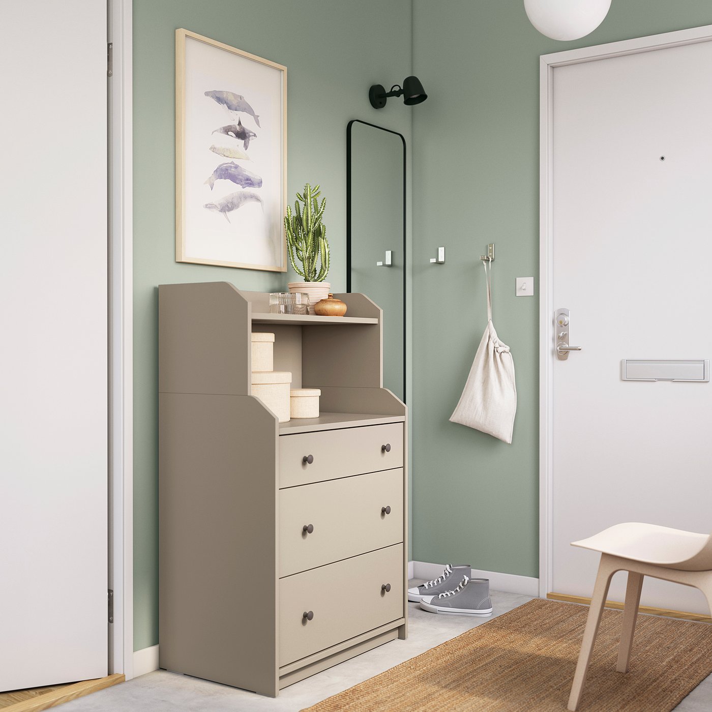 HAUGA storage unit with 3 drawers and shelf, against green wall, grey rug, white stool.
