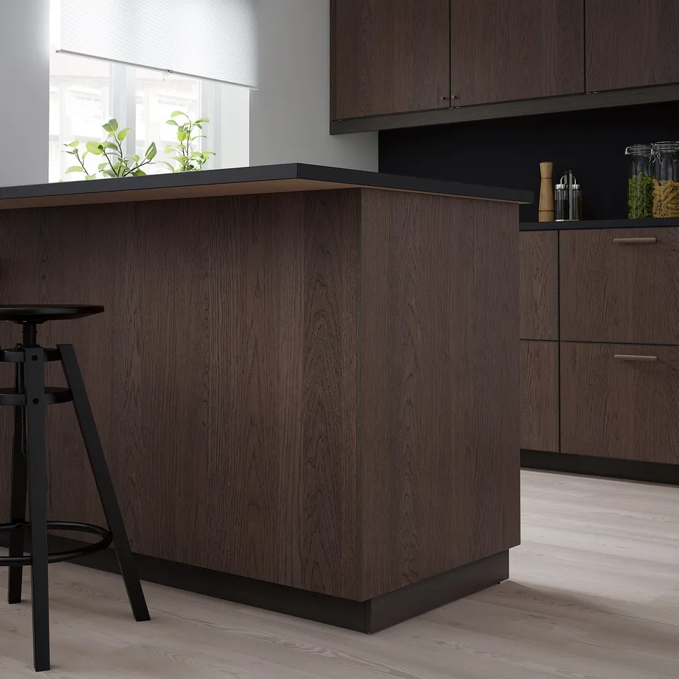 Modern kitchen with dark wooden SINARP cabinet. Sleek, square design. Large, matches high cabinets.
