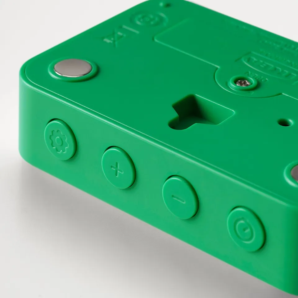 Bright green digital clock with round buttons; quality recycled plastic.