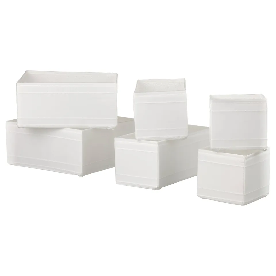Six SKUBB boxes, organised in two rows of three, space-saving when flat.