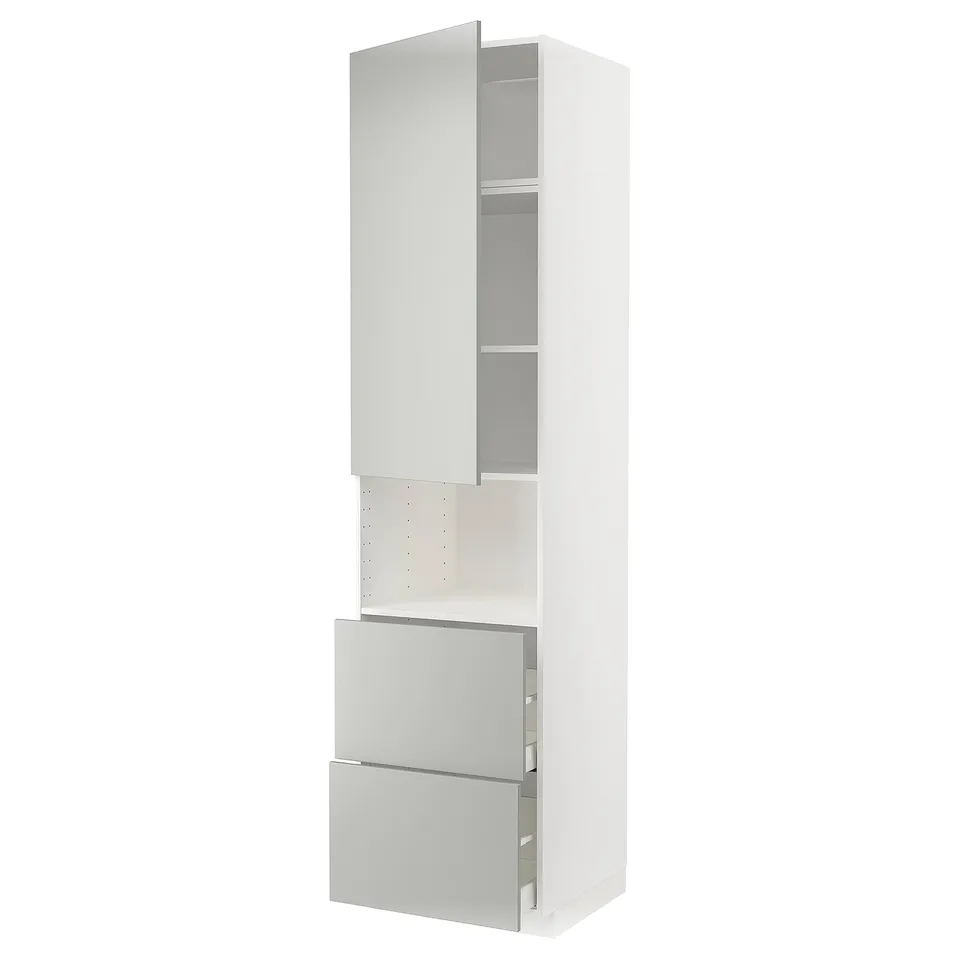 A white METOD kitchen cabinet with light grey drawers and a door. It stands tall, featuring a modern clean look with a minimalist design.