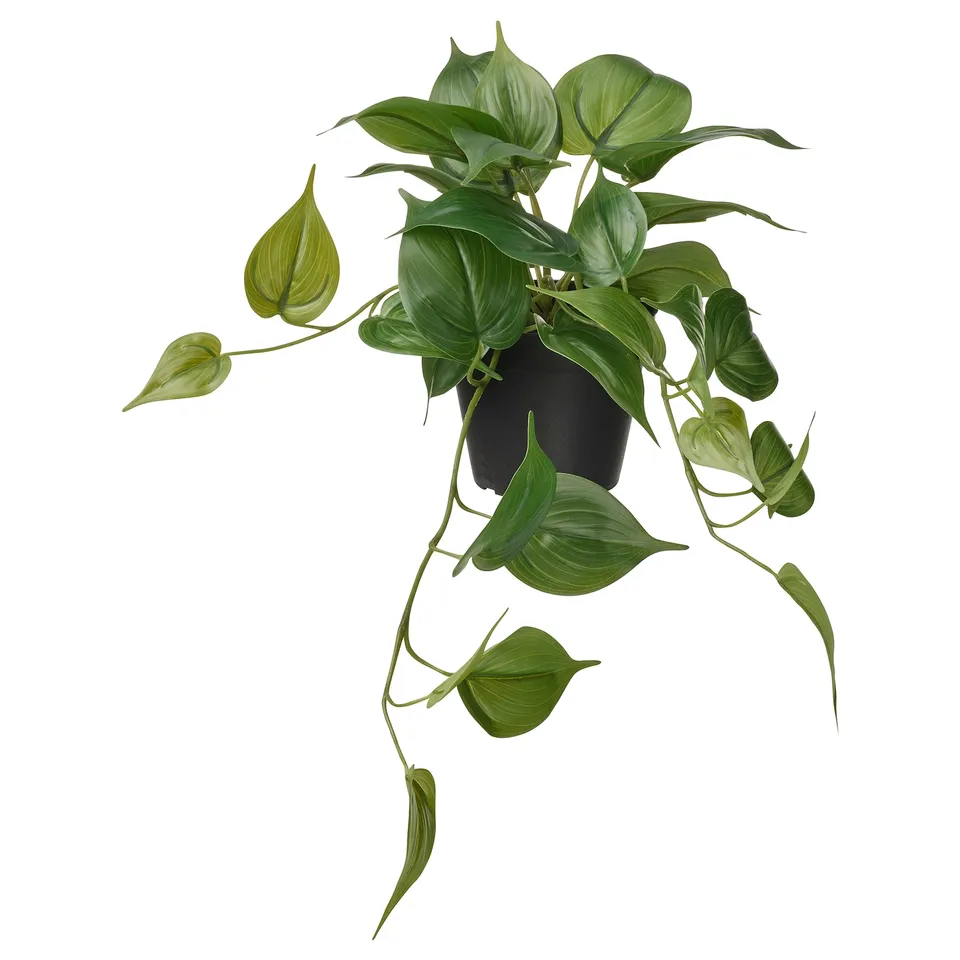 Potted green artificial plant with broad leaves; realistic, vibrant, and durable.