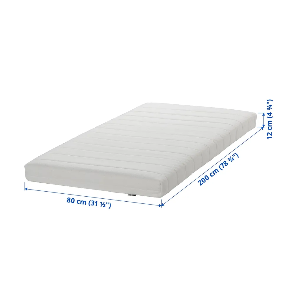 Simple foam mattress, white, rectangular, two layers, medium-firm, zippered cover.