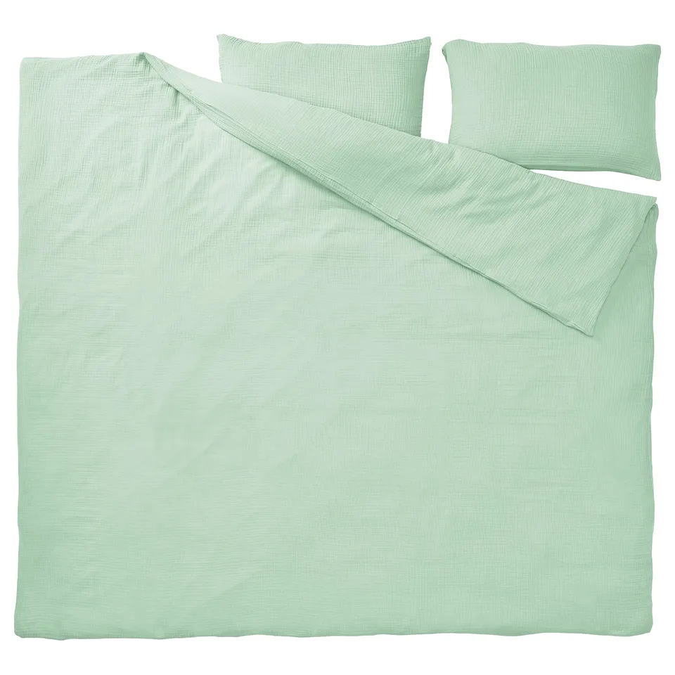 Green organic cotton bedding set with duvet cover, 2 pillowcases, wavy texture.
