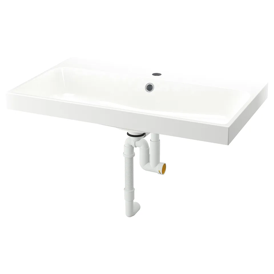 White BACKSJÖN marble sink, modern rectangular design.