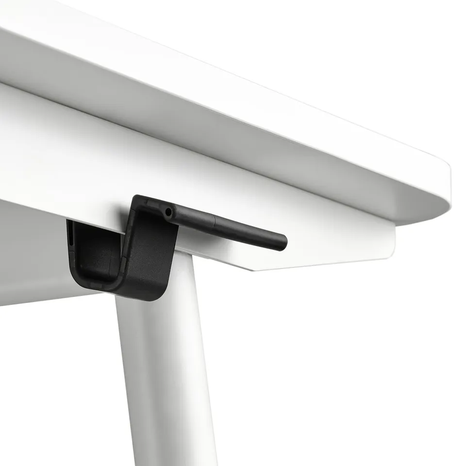 Close-up: sleek, white sit-stand desk. Black handle for smooth height adjustment.