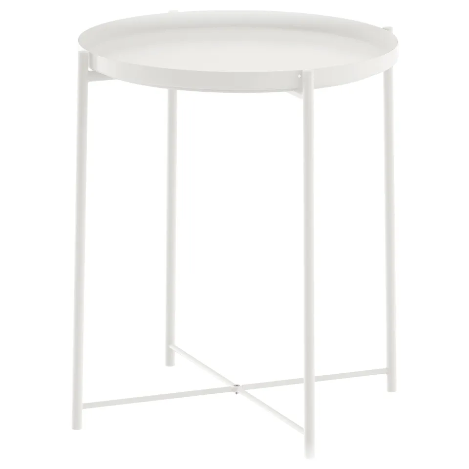 A white GLADOM side table with a round top and metal legs. The tray is removable for convenience.