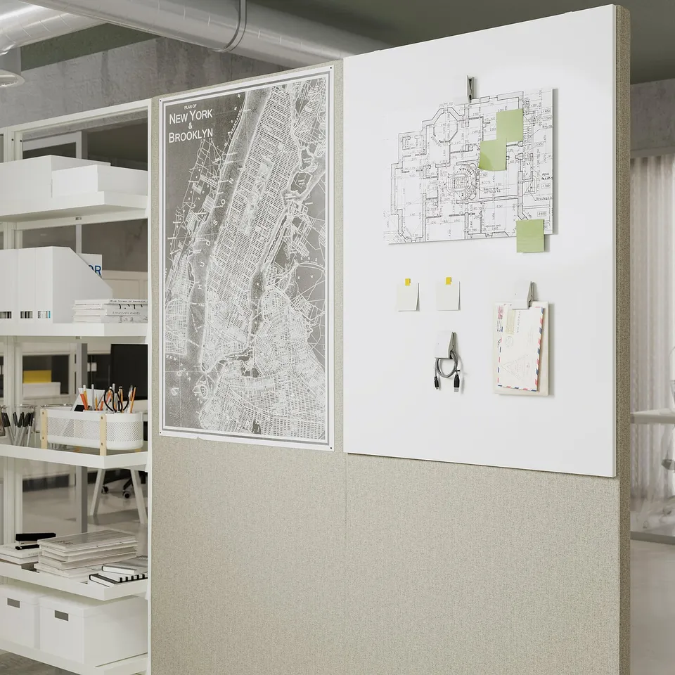 Office screen with whiteboard and pinboard sections. Holds maps and notes.