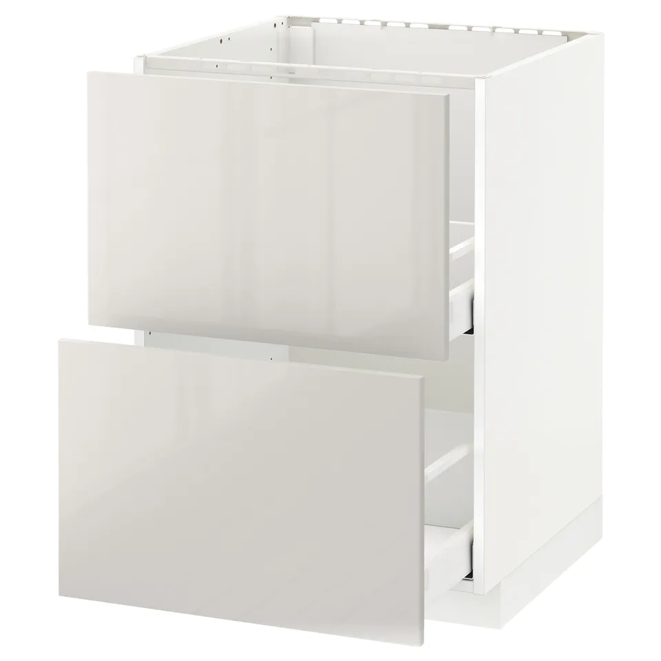 White modern METOD kitchen cabinet with glossy drawers, sleek and clean design.