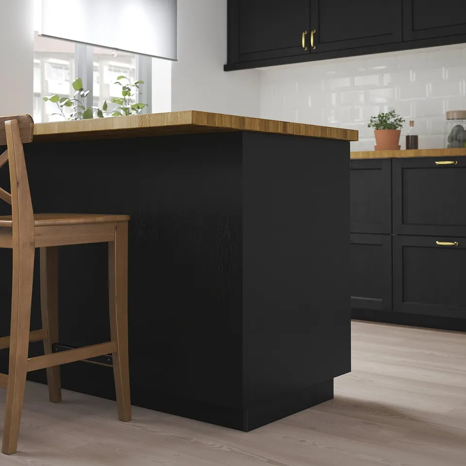 LERHYTTAN black kitchen island, large, square, wooden with light floors.