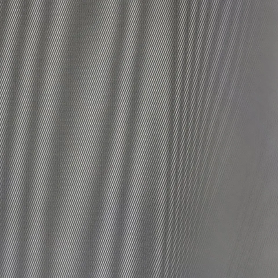 Textured fabric with subtle diagonal pattern. Blue tones fade to brown.