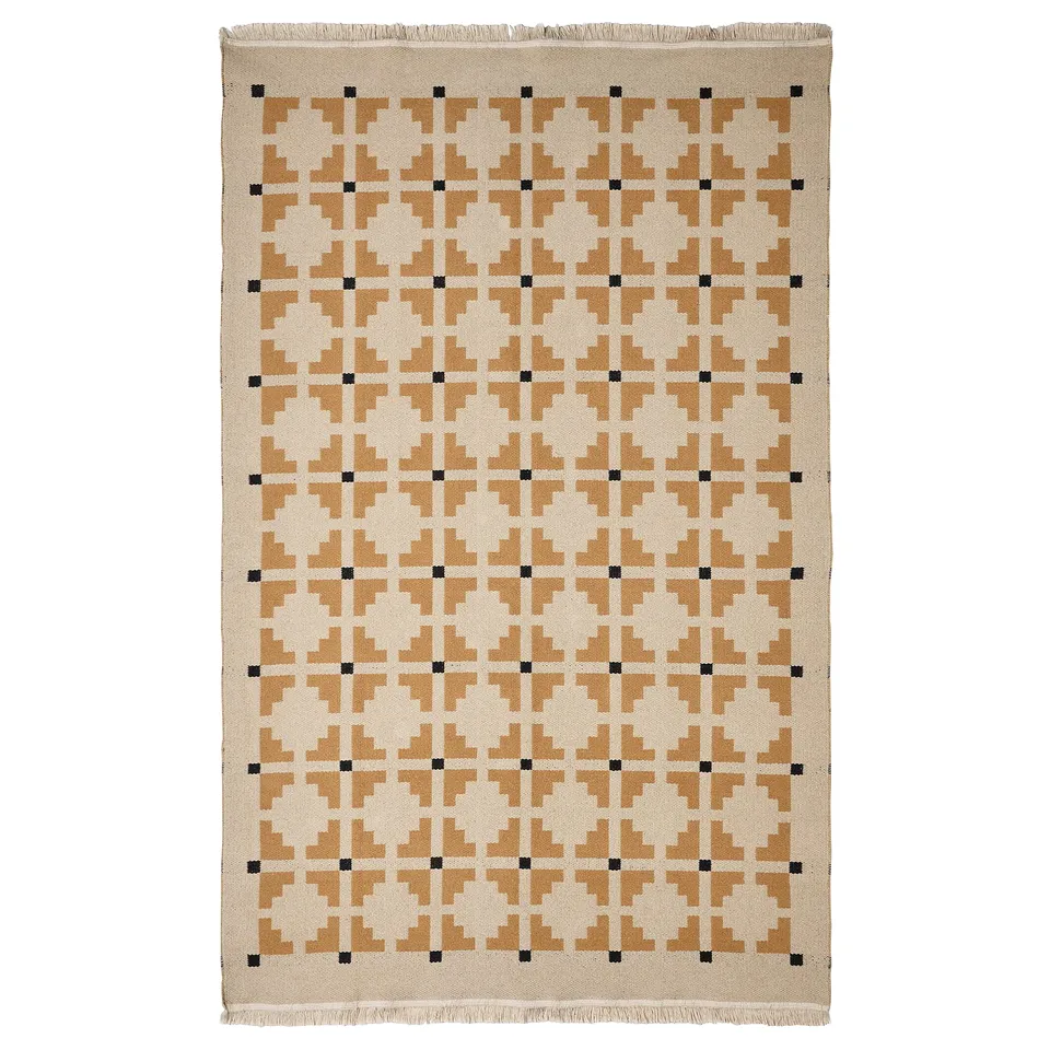 A beige and brown geometric pattern rug named TELEGRAFLINJE, made of cotton, rectangular with a flatwoven design.