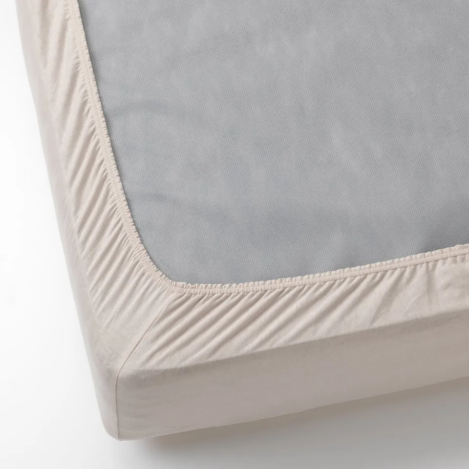 Fitted bed sheet, elastic corners for secure fit.