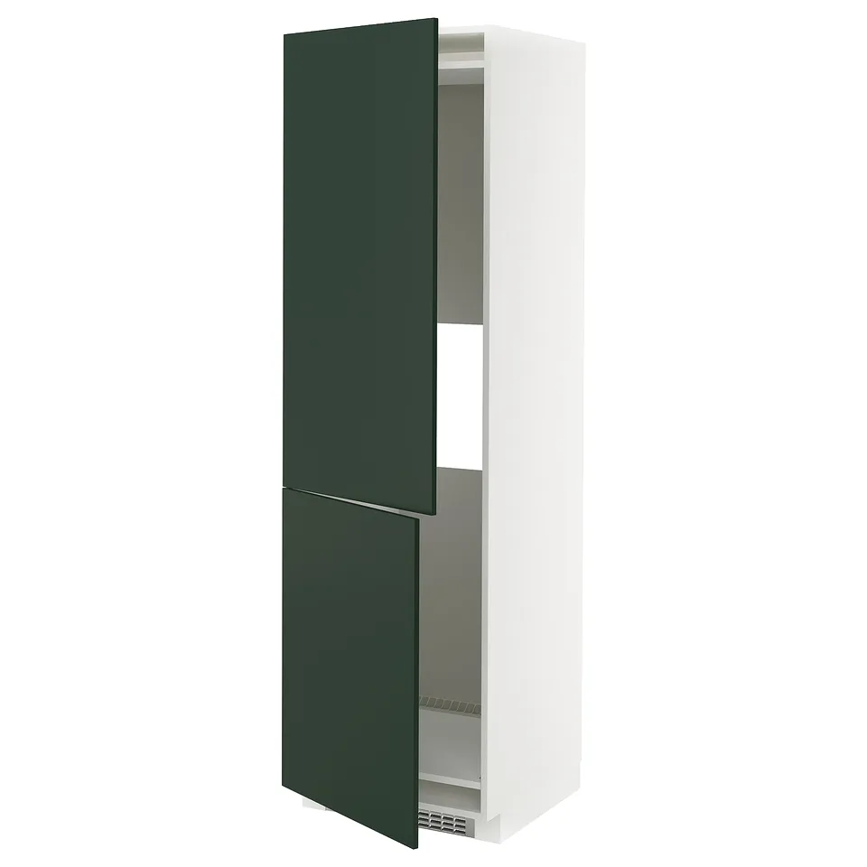 A white METOD kitchen cabinet with green havstorp doors, featuring a tall, rectangular shape with an adjustable shelf and a 25-year guarantee.