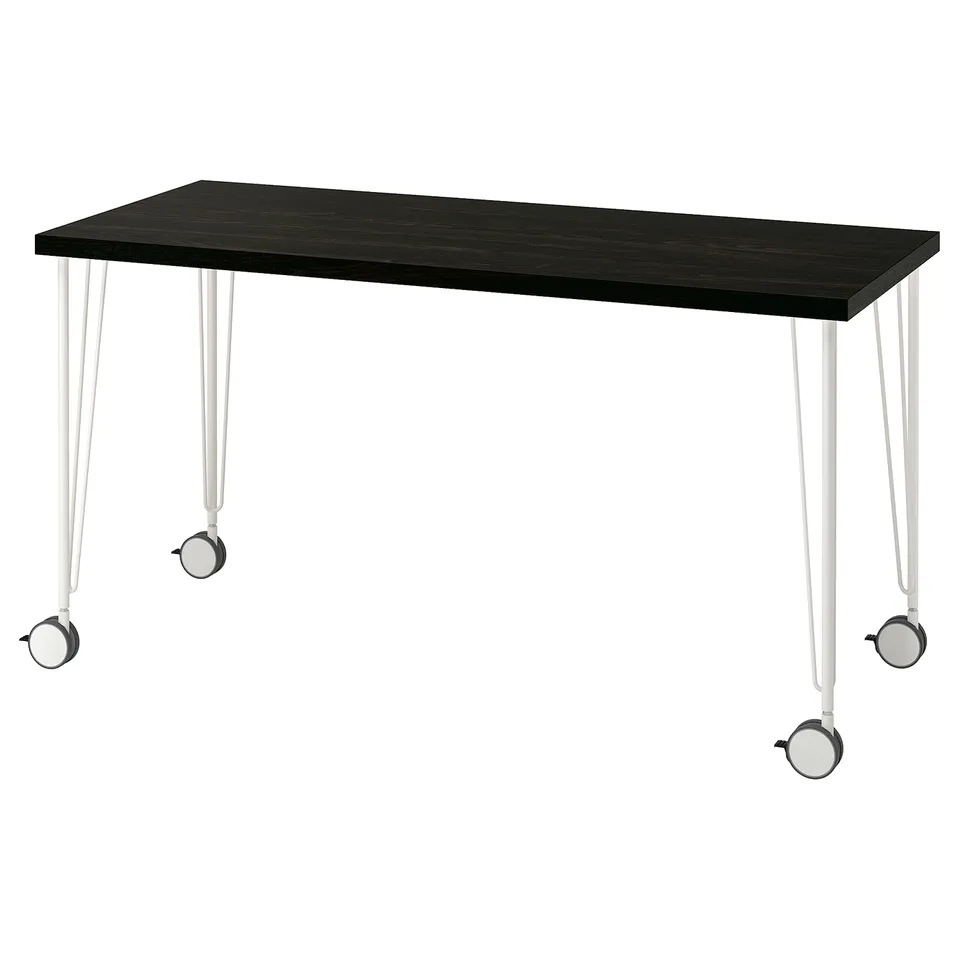 LAGKAPTEN, black desk, four white legs with wheels.