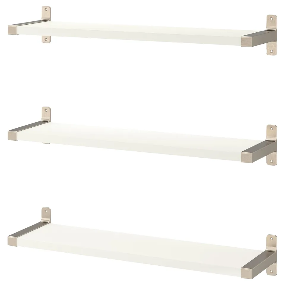 Three white wall shelves with metallic brackets, each featuring a sleek design. Ideal for custom fitting and versatile placement.