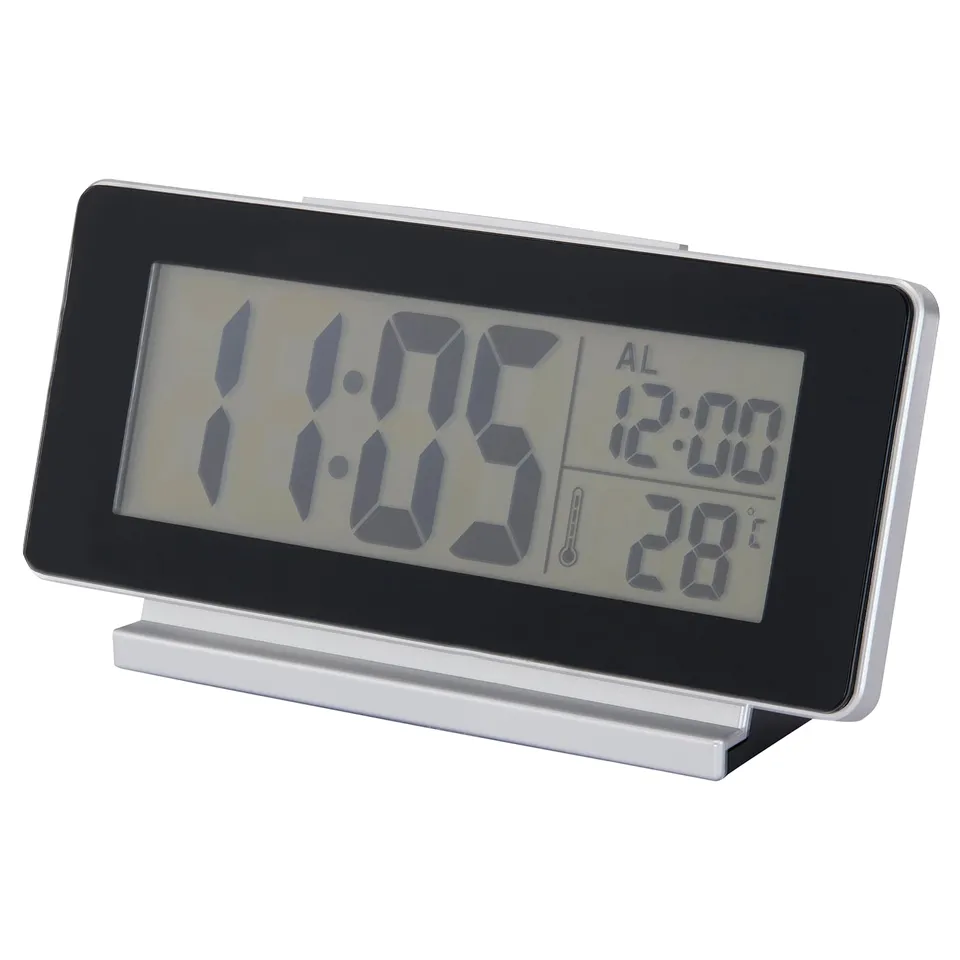 A FILMIS black and silver digital clock with led display, showing time, alarm, and temperature.