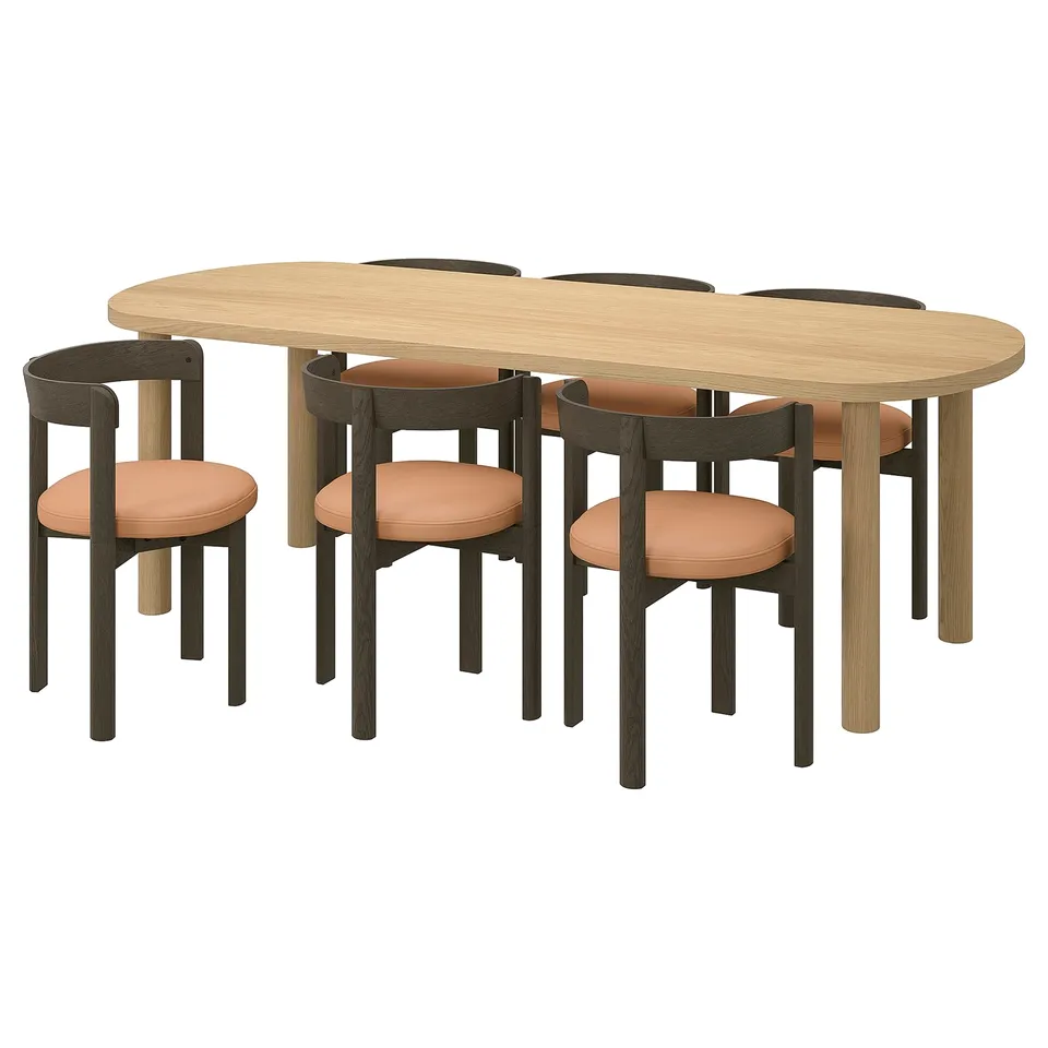 The STOCKHOLM 2025 dining set, featuring an oval wooden table and four leather chairs with modern, curved designs in oak and beige.