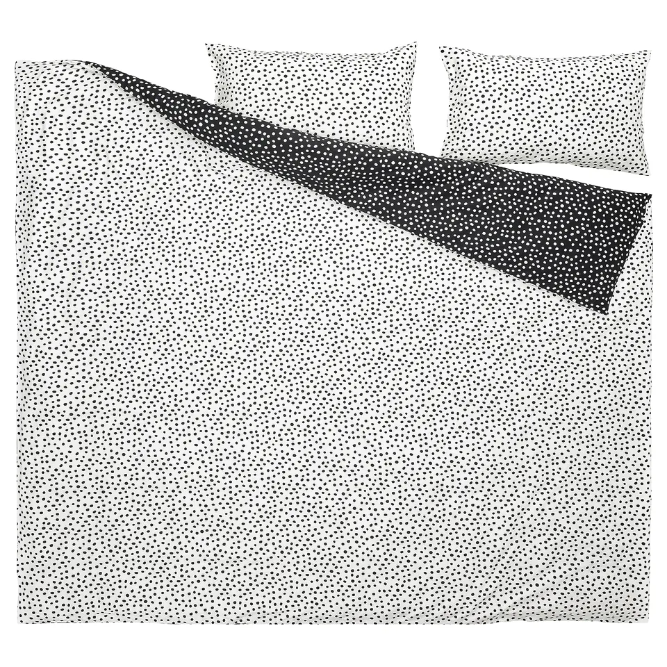 Black and white polka dot duvet set, including cover and pillowcases, featuring a blend of cotton and viscose.