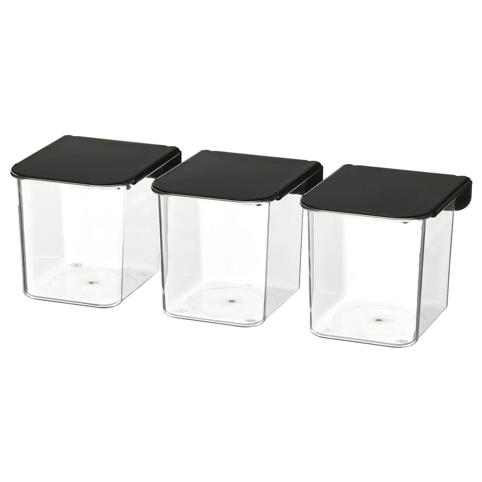 Three clear rectangular plastic containers with black hinged lids, stacked neatly in a row. Ideal for kitchen or office storage.