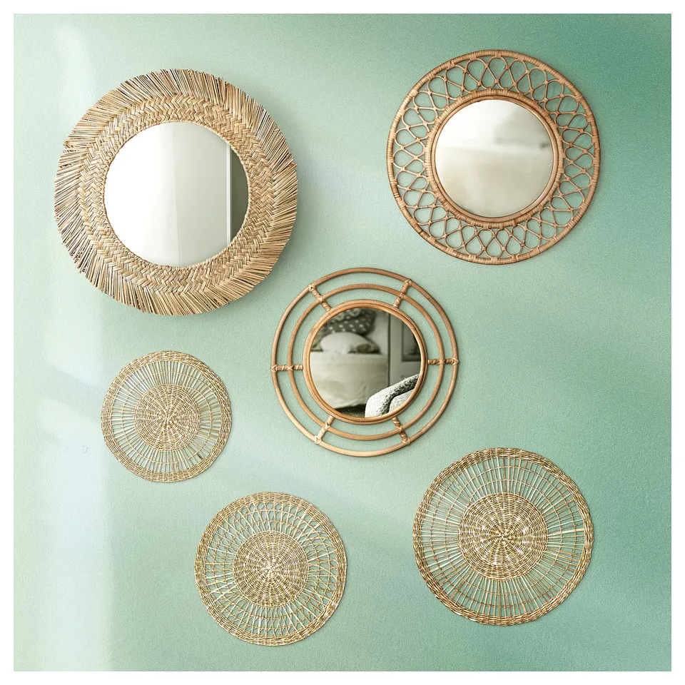 Wall decor: VRIGSTAD natural wicker mirrors, green backdrop, diverse shapes & designs, handcrafted, adds vibrant warmth.