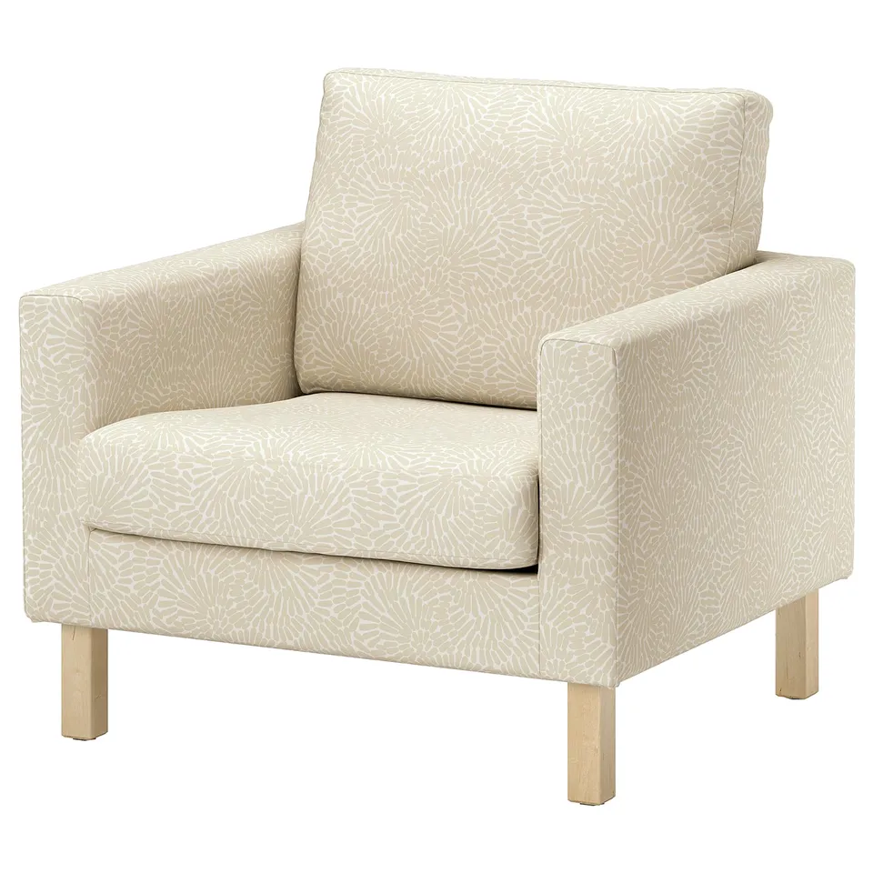 Beige SALTSJÖBADEN armchair with pattern, soft cushion, wooden legs, removable cover.
