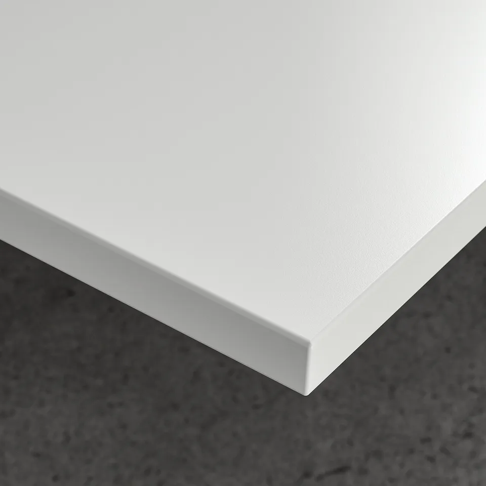 Modern white desk with smooth, stain-resistant surface, clean lines, and quality craftsmanship.