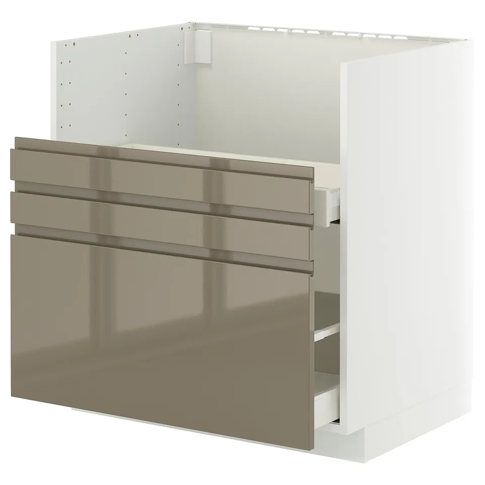 Modern kitchen cabinet with dark brown glossy fronts and integrated handles.