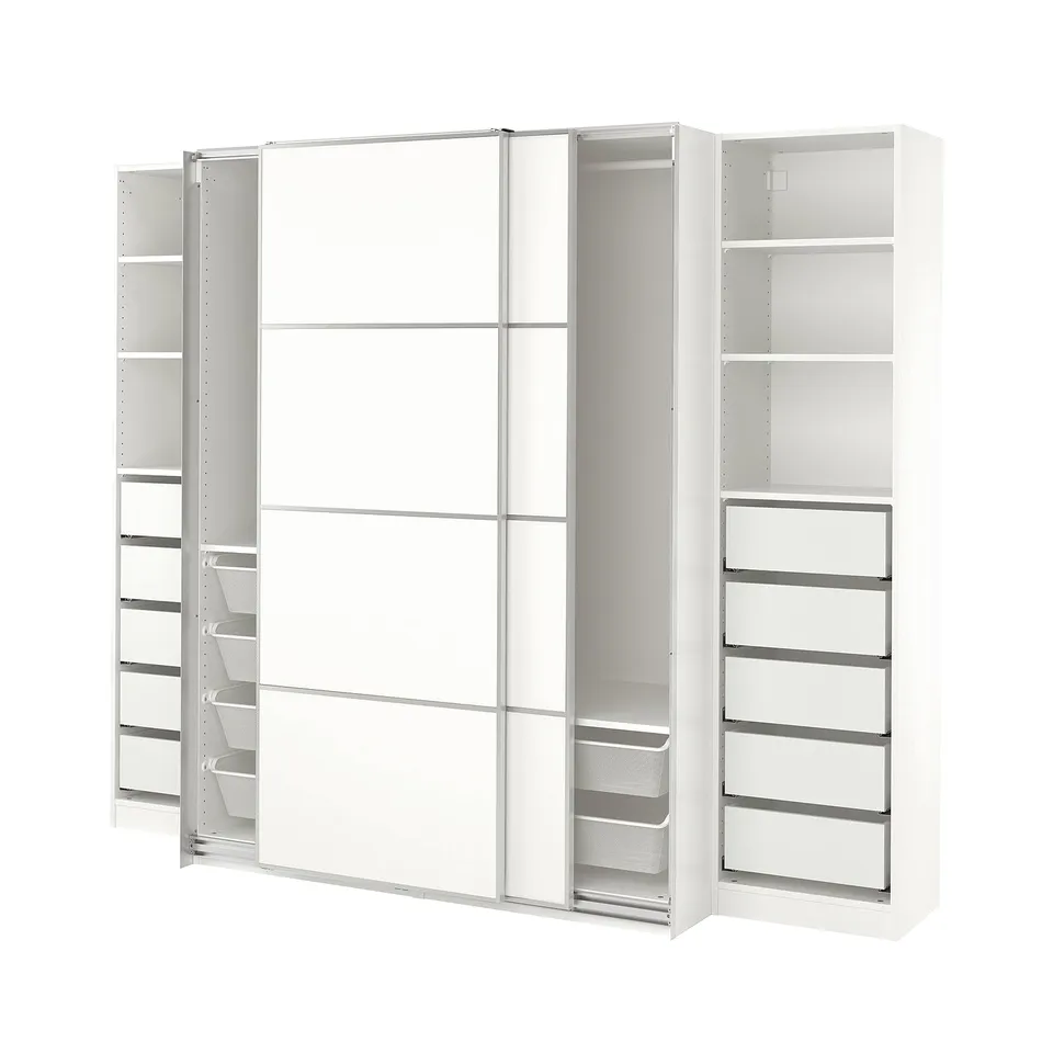 Displays a white PAX wardrobe with sliding doors, consisting of shelves and mesh drawers for organised storage.
